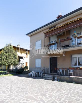 QUADRILOCALE CON GIARDINO, CANTINA E POSTO AUTO!