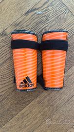 Parastinchi adidas calcio arancioni con fasce elas