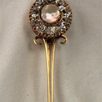Spilla in oro 750 e pietre naturali