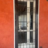 Porta inferriata nera