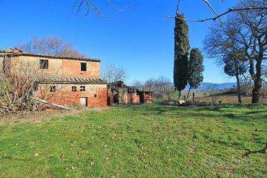 Cortona (AR), porzione di casale con terreno