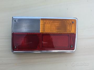 Faro post. e cornice ant. Volvo 144