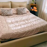 letto matrimoniale vera pelle.