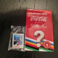 Spilla coca cola milano cortina 2026