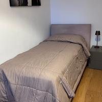 Letto singolo imbottito moderno