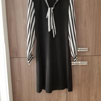 abitino nero con maniche trasparenti.  Lesara 