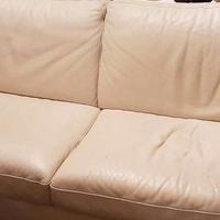 Divano panna in vera pelle, quadri