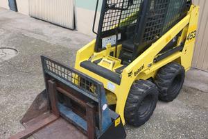 Minipala Bobcat 453 12 Quintali con forche.