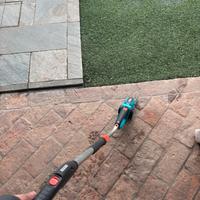 Tagliaerba con bastone