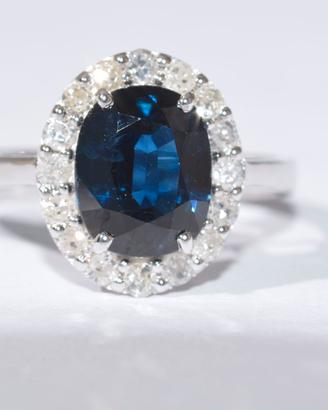 Anello Oro 18kt con 16 diamanti bianchi e Zaffiro