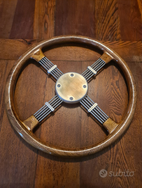 Volante a croce artigianale in acciaio tornito