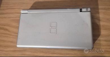 Nintendo DS + 3 giochi + scocca di ricambio