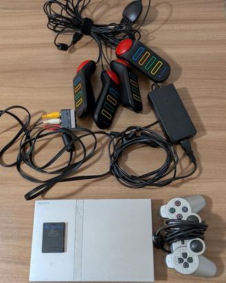 PlayStation 2 Silver Slim con memory card e giochi