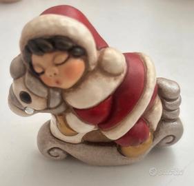 Thun “bimba di Natale su  cavallo a dondolo “