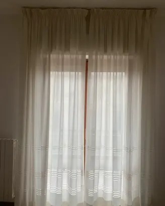 Coppia tende eleganti a cascata con ricami