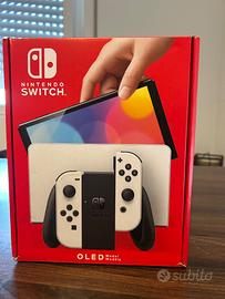 Switch OLED Bianca + accessori e 4 giochi