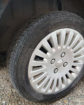 4 cerchi originali 4 gomme seminuove