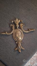 Fregio decorativo antico in lega metallica 