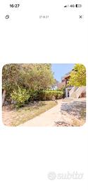 Villetta a schiera con giardino