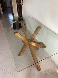 Tavolo in vetro con gambe in legno