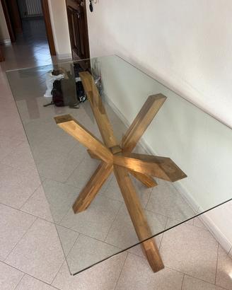 Tavolo in vetro con gambe in legno