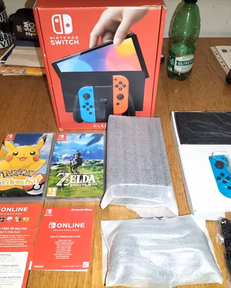 Switch OLED pari al nuovo + Zelda + Pokémon Torino