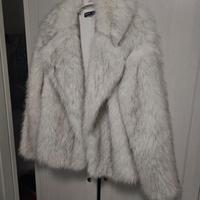 pelliccia nuova mai usata