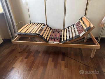 Letto con rete elettrica a doghe