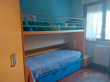 Cameretta con letto scorrevole e cabina armadio