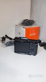 Zv-E10 Kit (16-50mm) + 3 Batterie + Cage