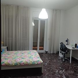 Ampia e comoda stanza in prestigioso appartamento