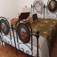 Letto antico in ferro battuto