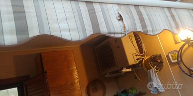 Tende da sole con telo da sostituire