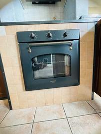 Forno elettrico colore nero HOTPOINT 73 L.