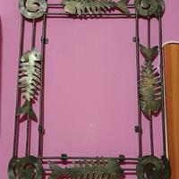 cornice scultura per specchio in ferro con pesci 