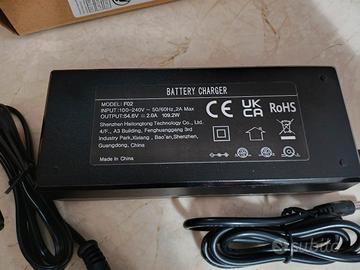 Caricabatterie 54.6V 2A per bici elettrica (Nuovo)