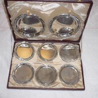 SOTTOBICCHIERI INOX CON VALIGETTA