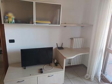 Arredo con mobili