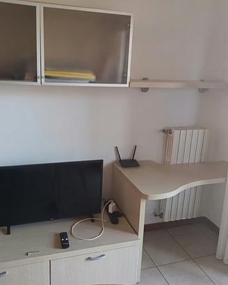 Arredo con mobili