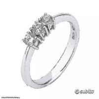 ANELLO TRILOGY ORO 18kt. CON DIAMANTI NATURALI