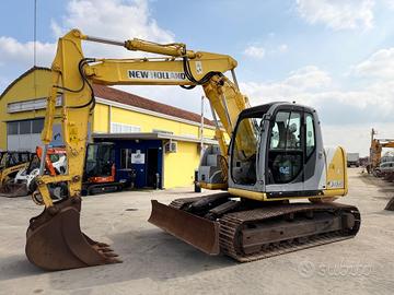 Escavatore NEW HOLLAND E145B TRIPLICE E LAMA