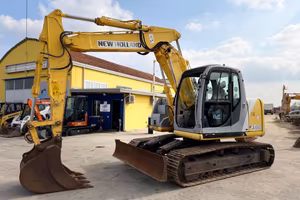 Escavatore NEW HOLLAND E145B TRIPLICE E LAMA