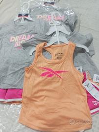 Stock abbigliamento bimbi