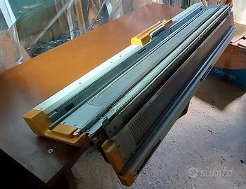 Macchina da maglieria due fronture accessoriata