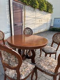 Tavolo rotondo e sedie vintage