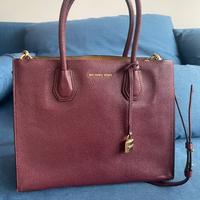 Borsa Michael Kors in pelle martellata viola