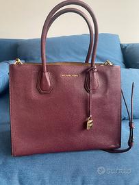 Borsa Michael Kors in pelle martellata viola