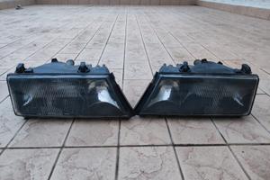 fari anteriori fumè Lancia dedra originali 