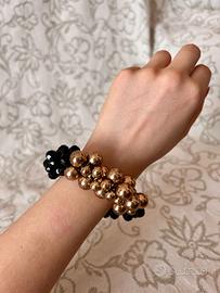 Bracciale con perle nere e oro