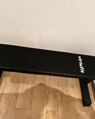 Panca piana, 64 kg di pesi, bilanciere e manubri